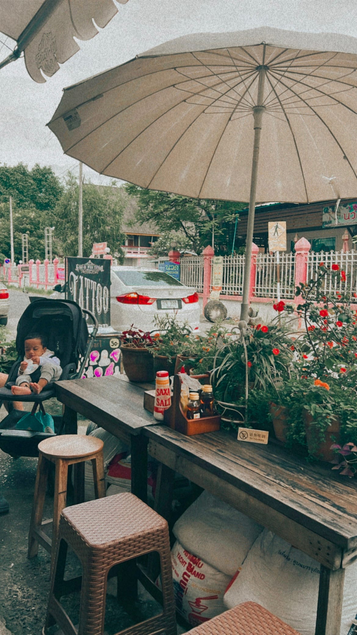 Sun Rays Café outdoor seating with baby in stroller